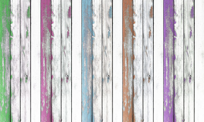 Wooden wall texture background. painted green, pink, blue; brown