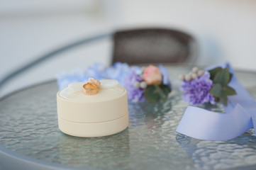 Two of wedding rings with bokeh background