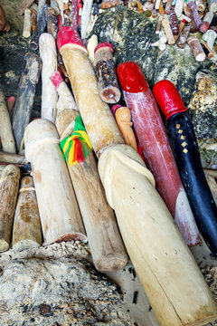 Wooden phalluses in Pranang cave. South Railay beach in Krabi. Thailand