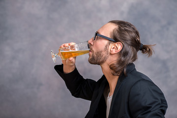 young man drinking beer
