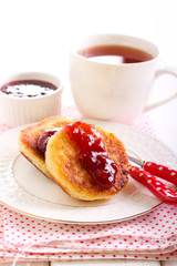 Ricotta cheese fritters with strawberry jam