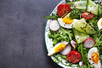 Greek salad in red boul