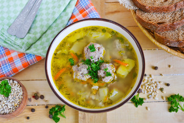 Soup with meatballs and barley