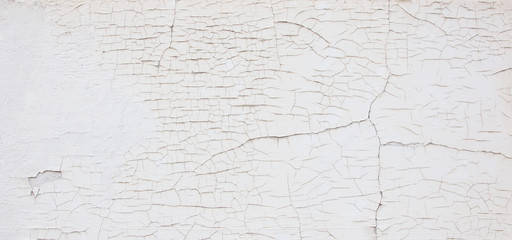 White wall with cracks
