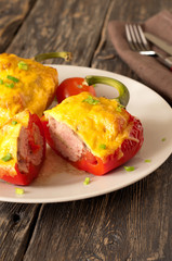 Stuffed peppers with meat, mushrooms, tomatoes and mozzarella ch