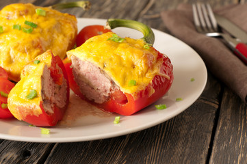 Stuffed peppers with meat, mushrooms, tomatoes and mozzarella ch