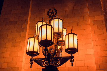 Vintage street light in front of Moscow State University at night
