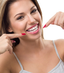 Woman showing her white teeth