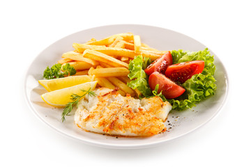 Fish dish - fried fish fillet and vegetables 
