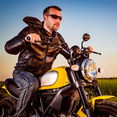 Fototapeta na wymiar Biker on a motorcycle