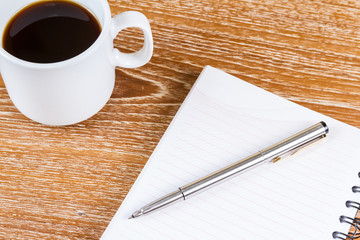 open blank notebook on table