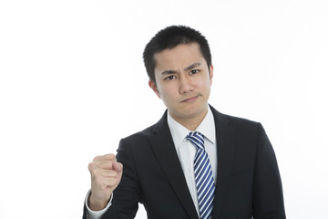ガッツポーズの男性　ビジネスマン　カメラ目線　白バック