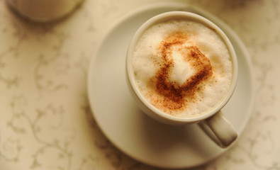 cup of cappuccino with heart