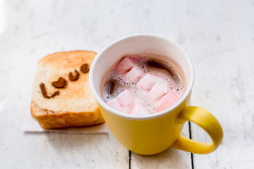 Love message on Bread sliced and chocolate cup and marshmellows