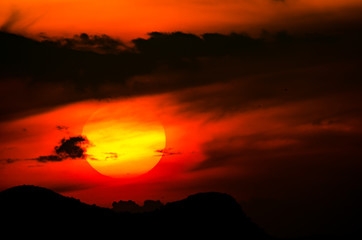 Big rising sun.