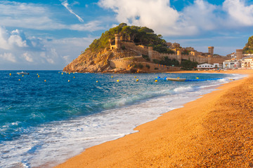 Sand Gran Platja beach and fortress in the morning in Tossa de Mar on Costa Brava, Catalunya, Spain