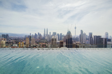 Swimming pool on roof top with beautiful city view. Kuala-Lumpur