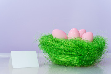 Purple easter eggs over purple background