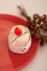 Italian cassata on the red plate