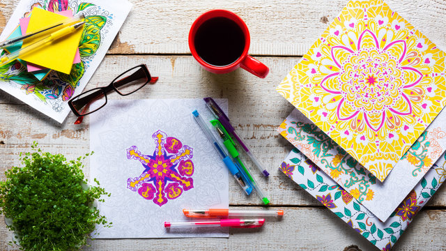 Adult coloring books, stress relieving trend, mindfulness concept