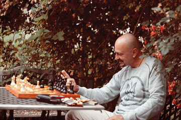 man playing chess thinking
