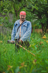 gardener with lawn mower