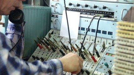 Brown wooden telephone central PBX