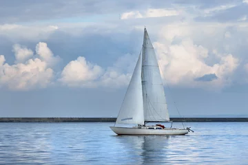 Fotobehang Zeilen White sail yacht sailing in a calm sea. Riga, Latvia  © Alex Stemmer