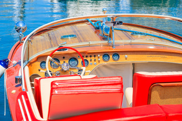 Stylish retro motor boat mooring in Calvi marina on western coast of Corsica island, France