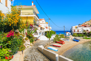 Fototapeta premium A view of street and houses in beautiful Kokkari fishing village, Samos island, Greece