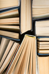 Naklejka premium Stack of hadrback books on white background. Library education concept. Back to school. Copy space