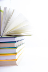 Stack of hadrback books on white background. Library education concept. Back to school. Copy space