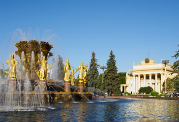  MOSCOW, RUSSIA - SEPTEMBER 16, 2014: ENEA, view of fountain "Friendship of peoples" and pavilion 71, ENEA, Moscow, Russia