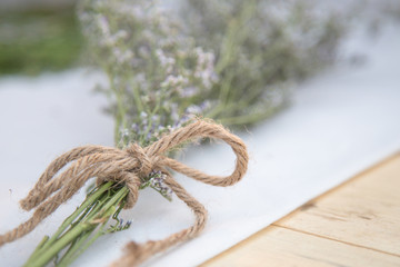Lavender Bouquet of tied with a rope and put it on the table.