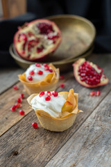 Filo pastry dessert with with fruits and pomegranate