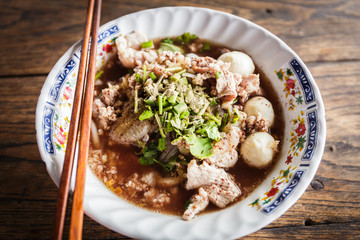 Thai noodle with soup on the table