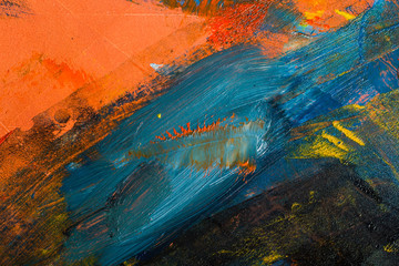 Abstract painted canvas. Oil paints on a palette.