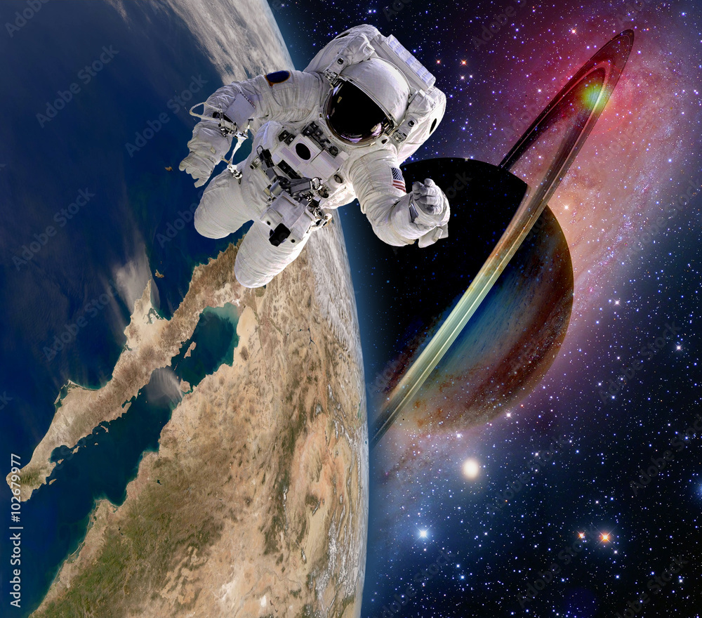 Canvas Prints astronaut spaceman sun saturn planet spacewalk earth outer space walk galaxy. elements of this image