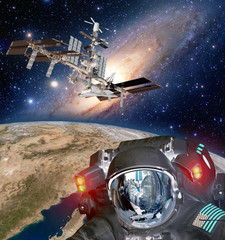 Astronaut helmet et alien extraterrestrial space ship ufo spaceship planet. Elements of this image...
