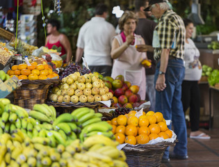 FUNCHAL, PORTUGAL - JUNE 25: Fresh exotic fruits in Mercado Dos - Powered by Adobe