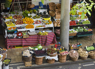 Obraz na płótnie Canvas FUNCHAL, PORTUGAL - JUNE 25: Fresh exotic fruits in Mercado Dos