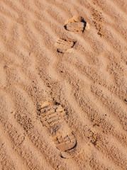 Footprint in the sand.