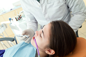 Healthy teeth patient at dentist office dental caries prevention.