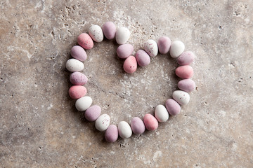 Chocolate eggs in the shape of a heart