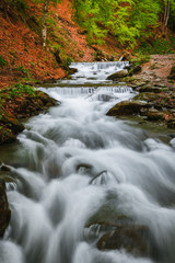 Carpathian Mountains. The mountain river near the waterfall Shipot