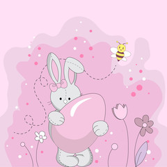 Pink Easter bunny holding a sugar egg