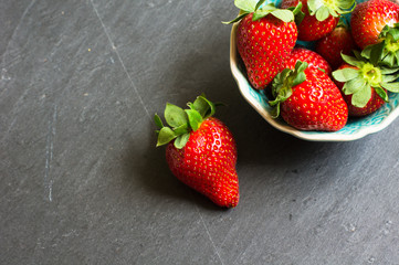 Fresh strawberries on  rustic background