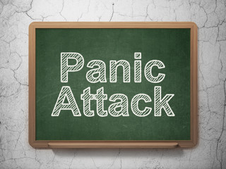 Health concept: Panic Attack on chalkboard background