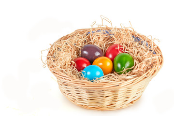 Isolated easter basket with six easter eggs