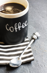 Cup of coffee  and stripped napkin